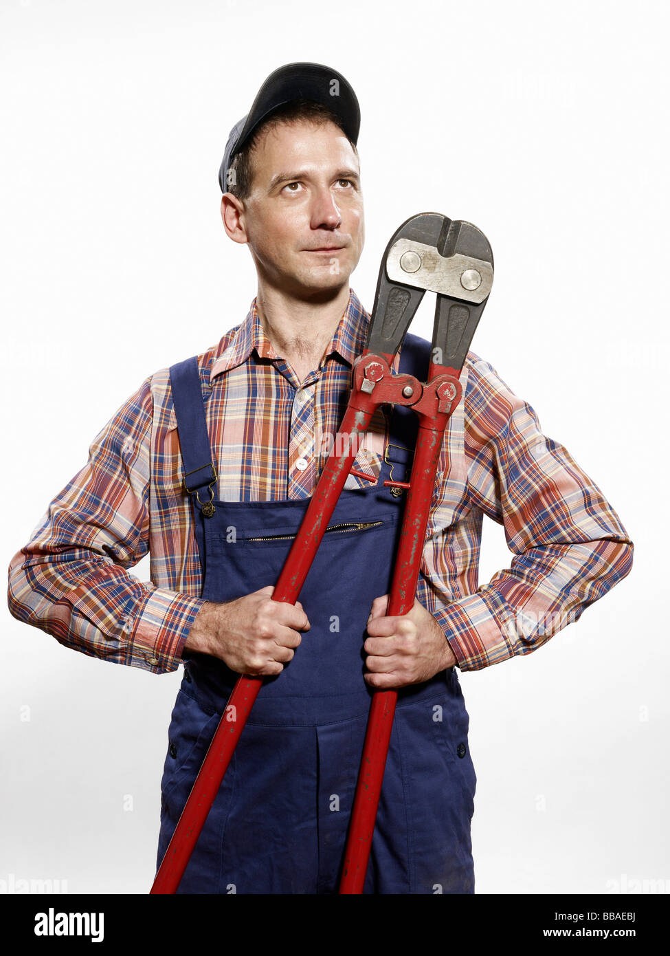 A man holding bolt cutters Stock Photo Alamy