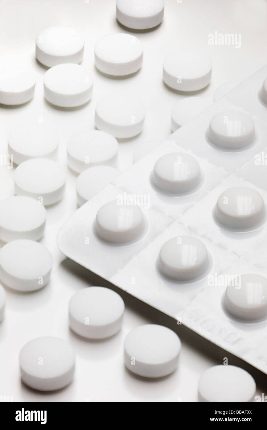 Pills and a blister pack Stock Photo