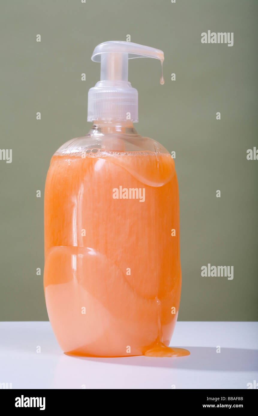 A dripping soap dispenser Stock Photo Alamy