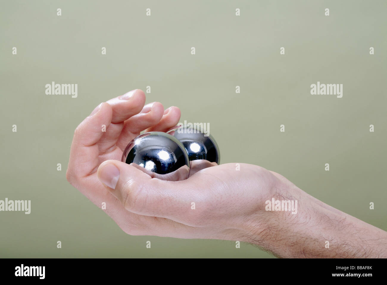 A human hand holding Chinese medicine balls Stock Photo Alamy