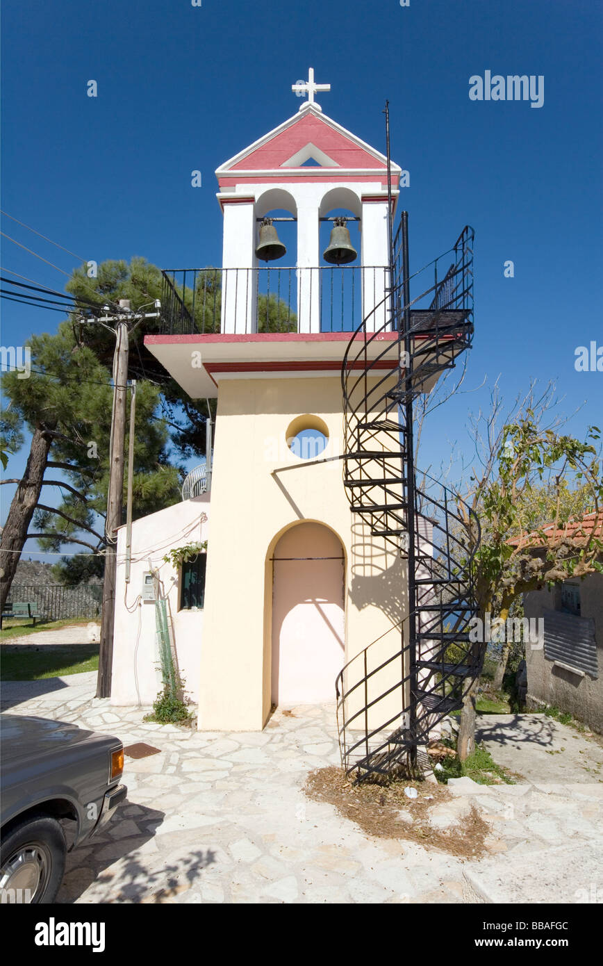 Church bell tower and spiral staircase Komitata, Kefalonia, Greece Stock Photo