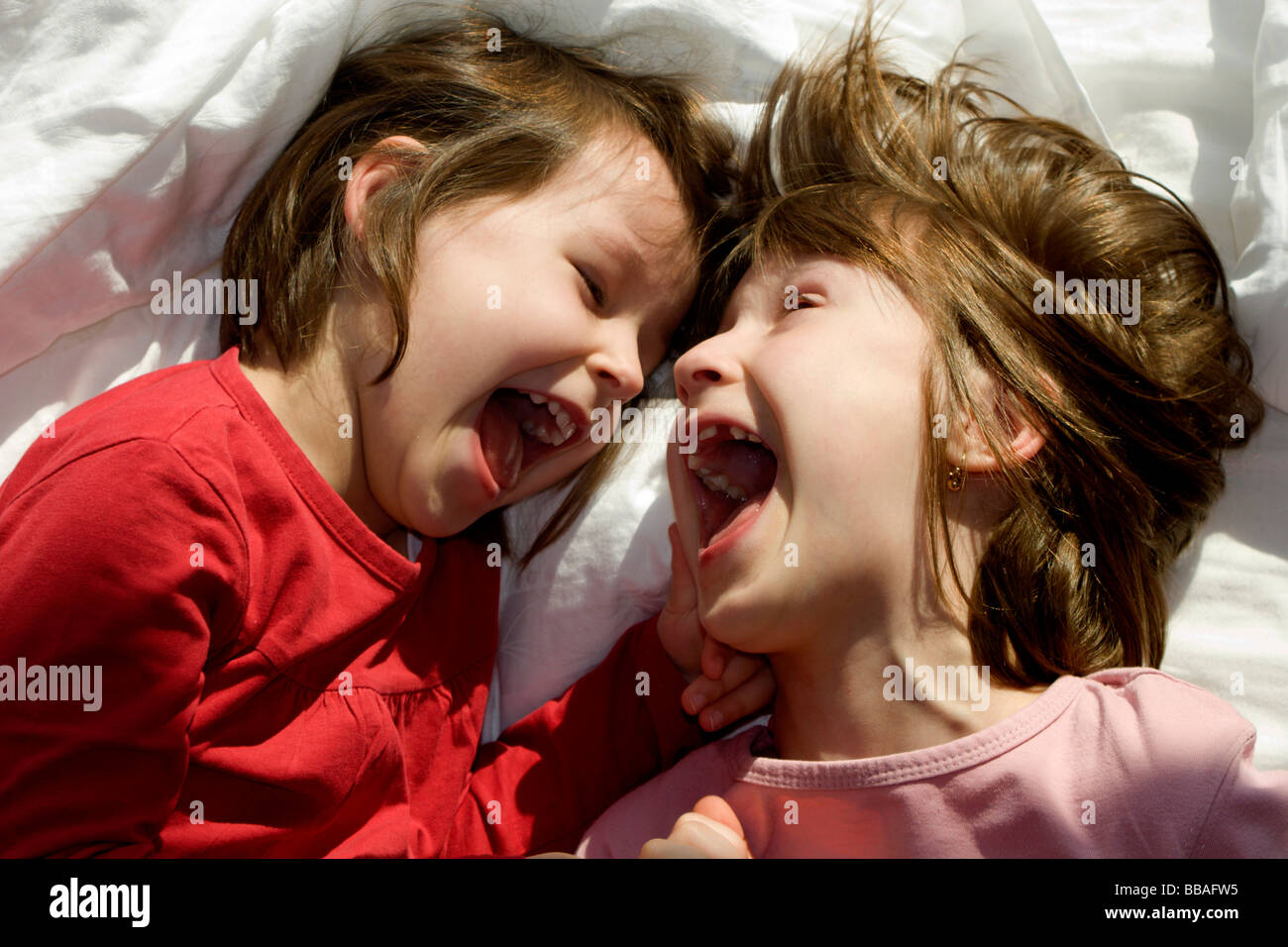 fun of children in the bed - morning Stock Photo
