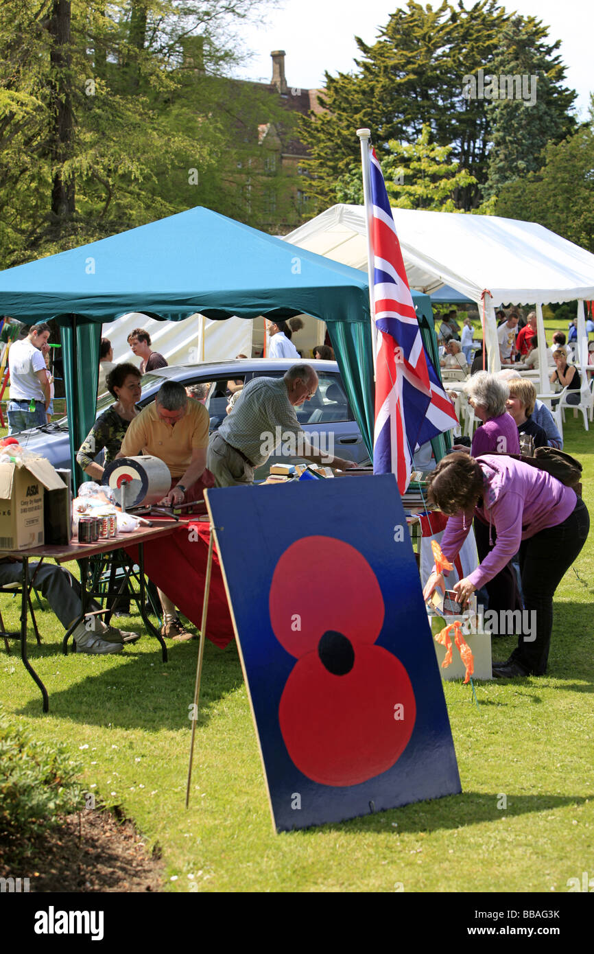A British Legion Poppy and Union Jack British flag at a Charity fete
