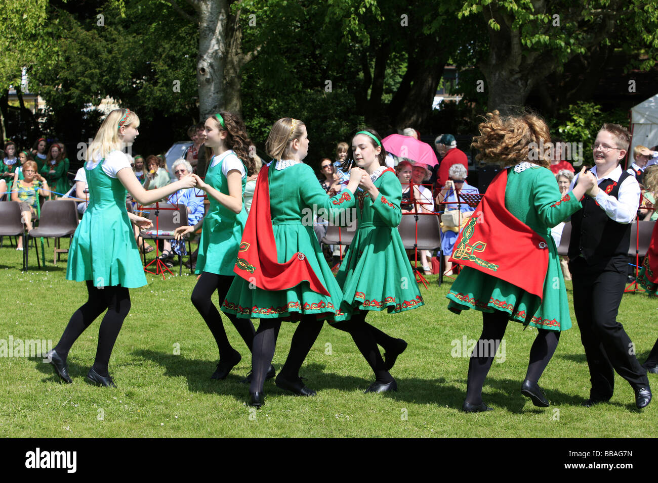 Young irish teenage girls dancing a traditional jig at a summer