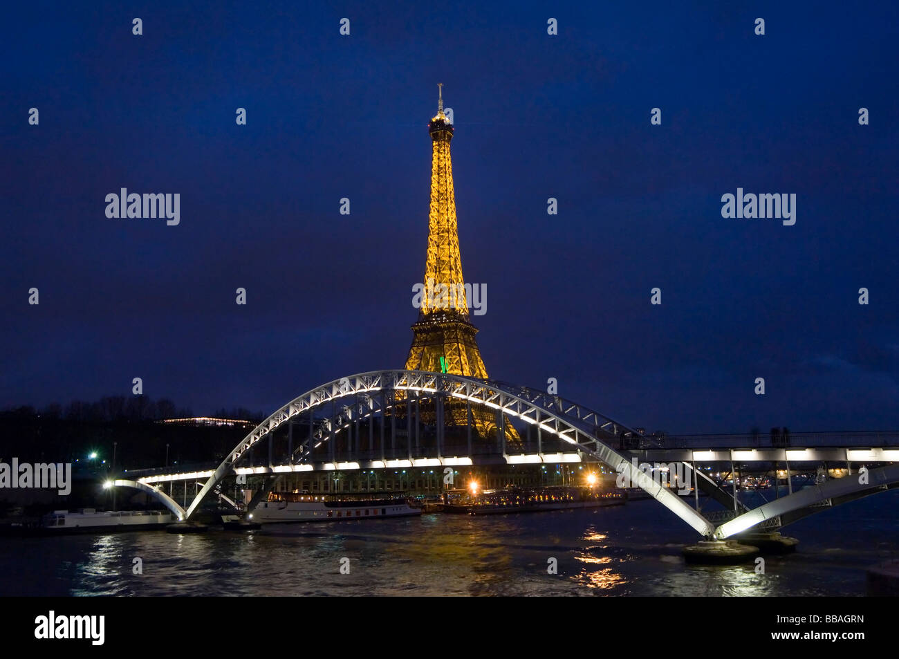 Night time Eiffel Tower lightshow over the river Seine, Paris, France Stock Photo Alamy