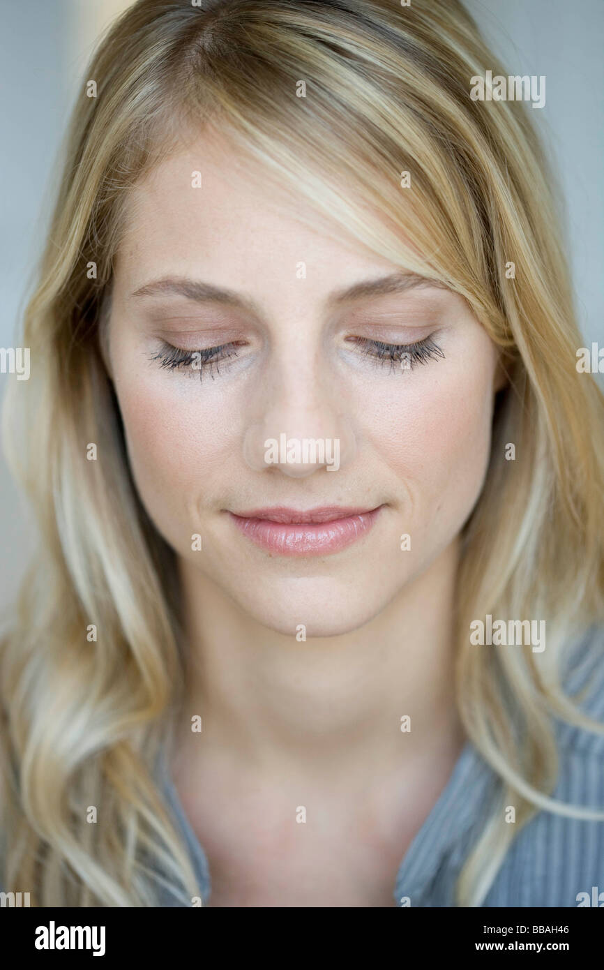 Woman looking down Stock Photo
