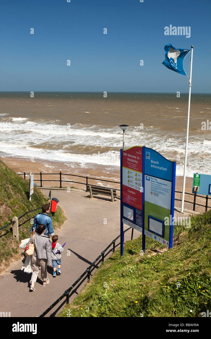 UK England Norfolk Mundesley seafront visitors walking down clifftop