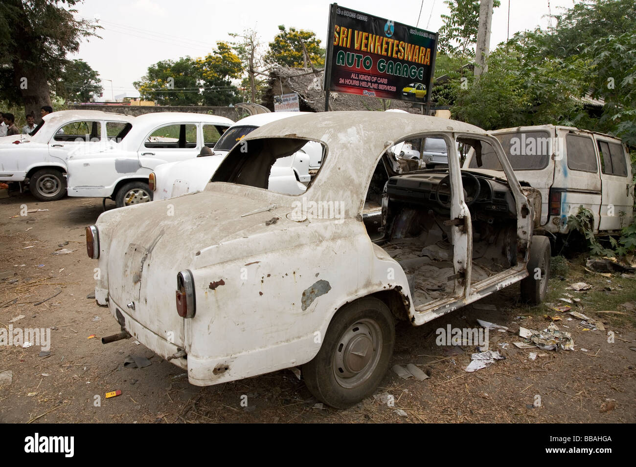 A garage repairs and scraps Ambassador cars in the small Indian town of Gingee in Tamil Nadu. Stock Photo