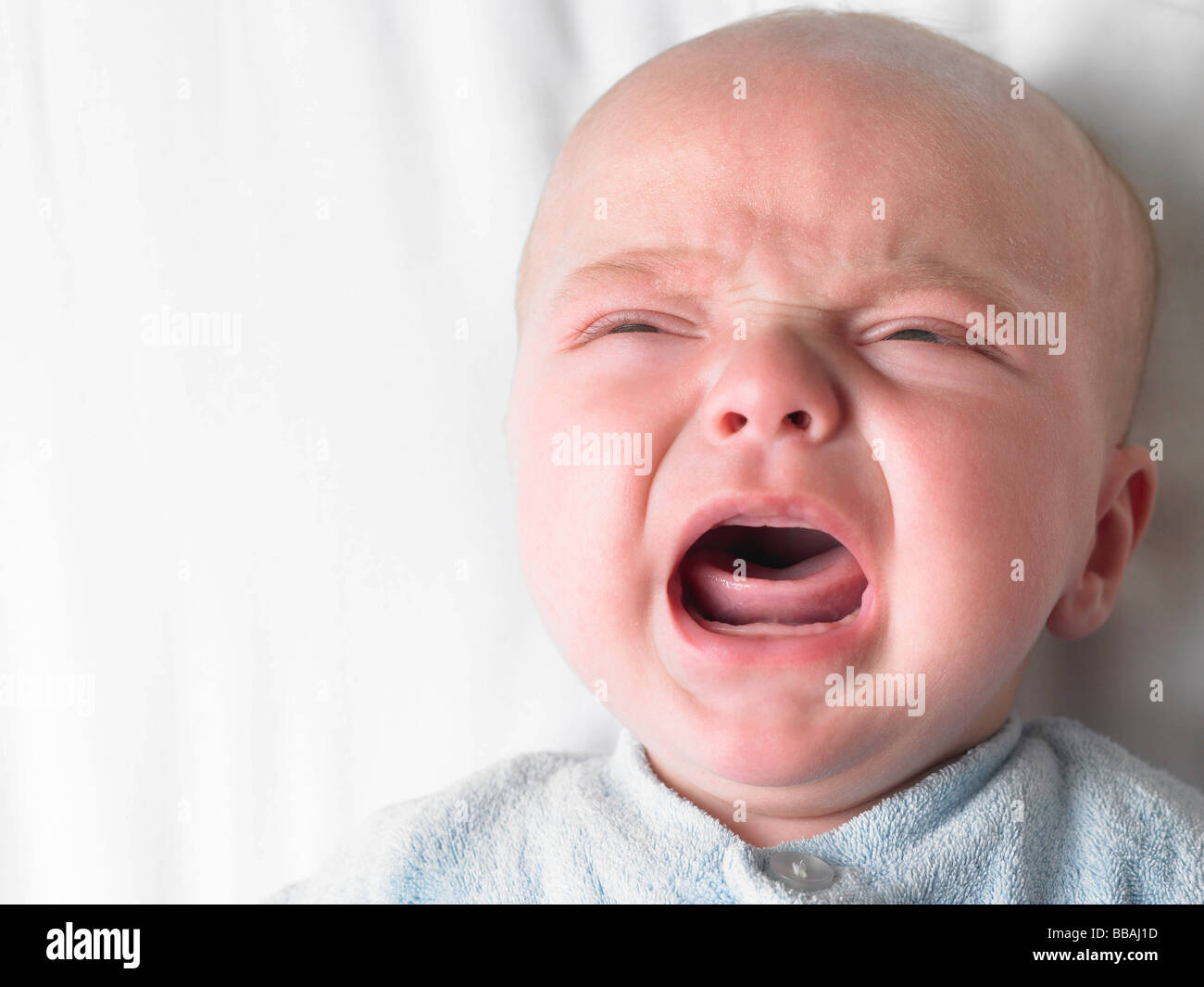 Crying baby face hires stock photography and images Alamy