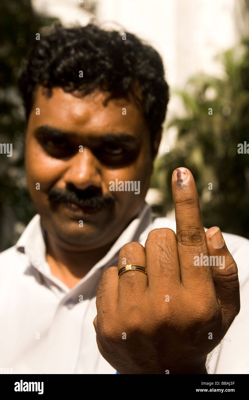 A member of the world's largest electoral franchise, India, proudly shows the mark of indelible ink that proves he has voted. Stock Photo