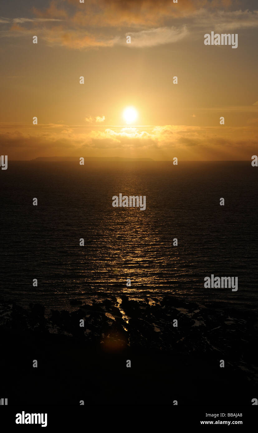 Sunset over Lundy Island (looks like Angel) Stock Photo
