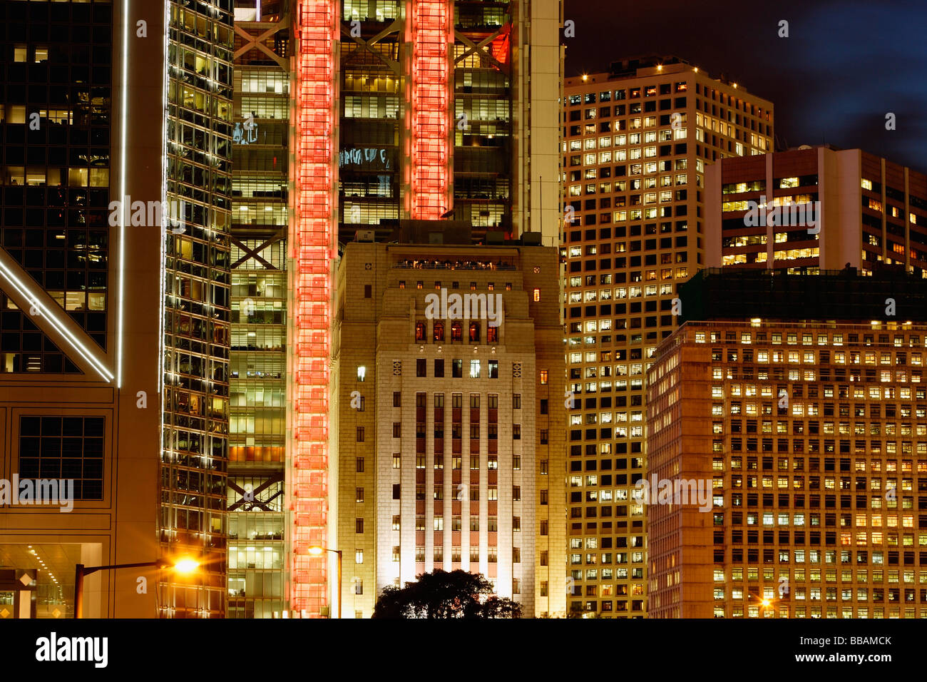 Buildings in Hong Kong at night Stock Photo - Alamy