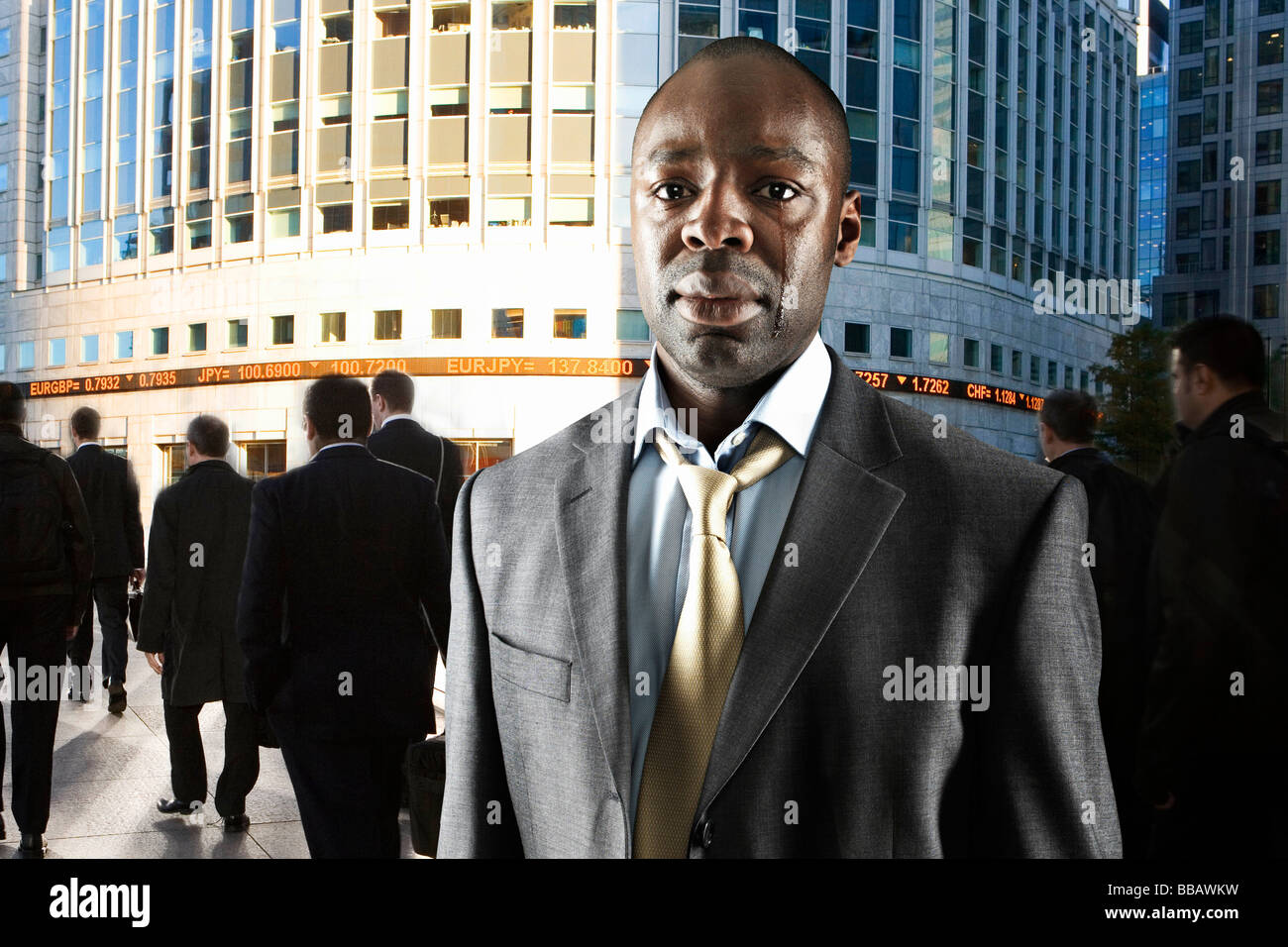 Suited businessman crying Stock Photo