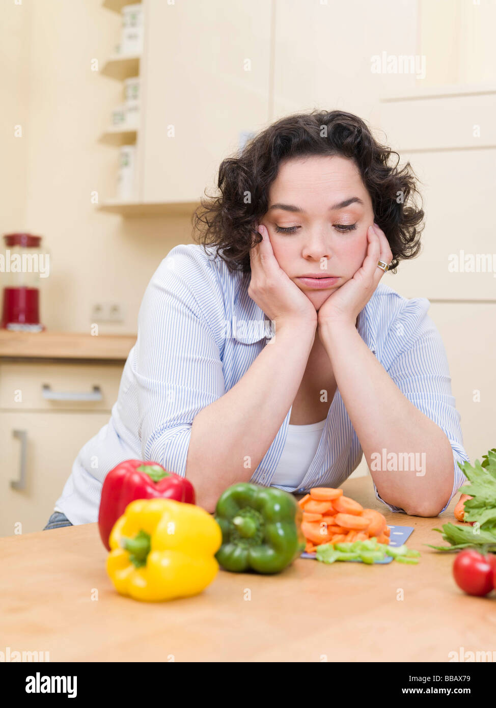 woman looking bored Stock Photo