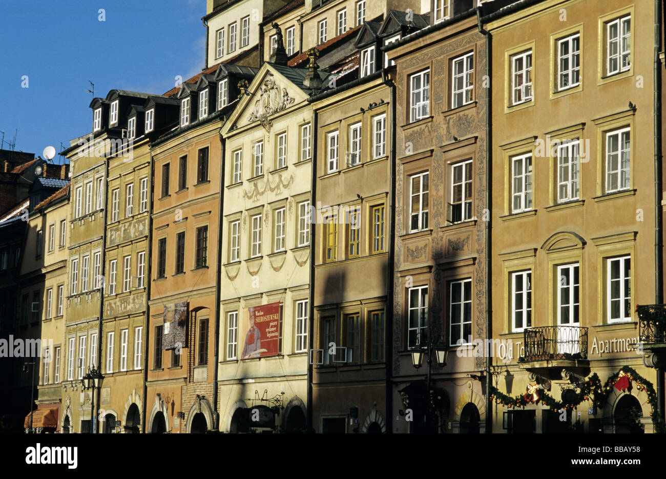 Poland Warsaw apartment houses in sunset on Old Town Square Stock Photo
