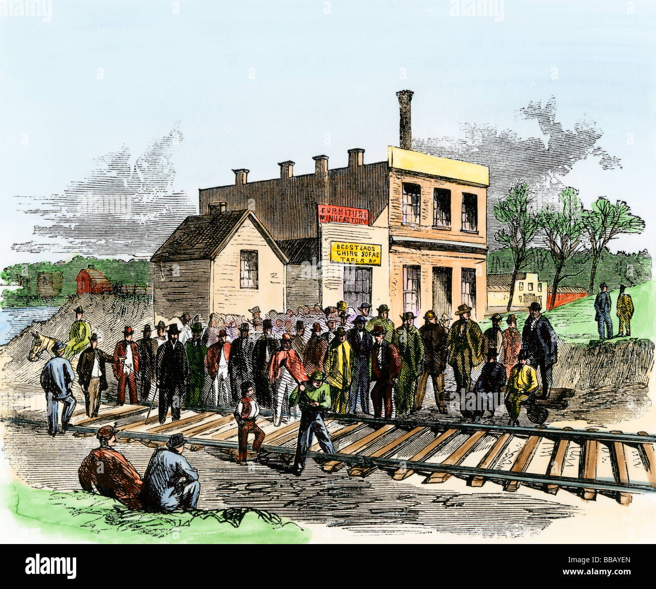 First spike on the Atchison & Pikes Peak Railroad 1865. Hand-colored woodcut Stock Photo