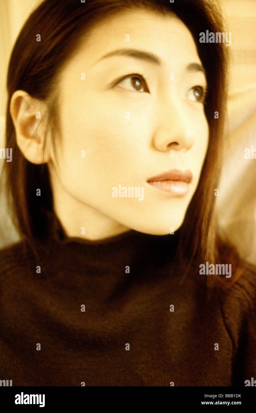 Model Looking Off Camera Woman in black turtleneck looking off camera Stock Photo - Alamy