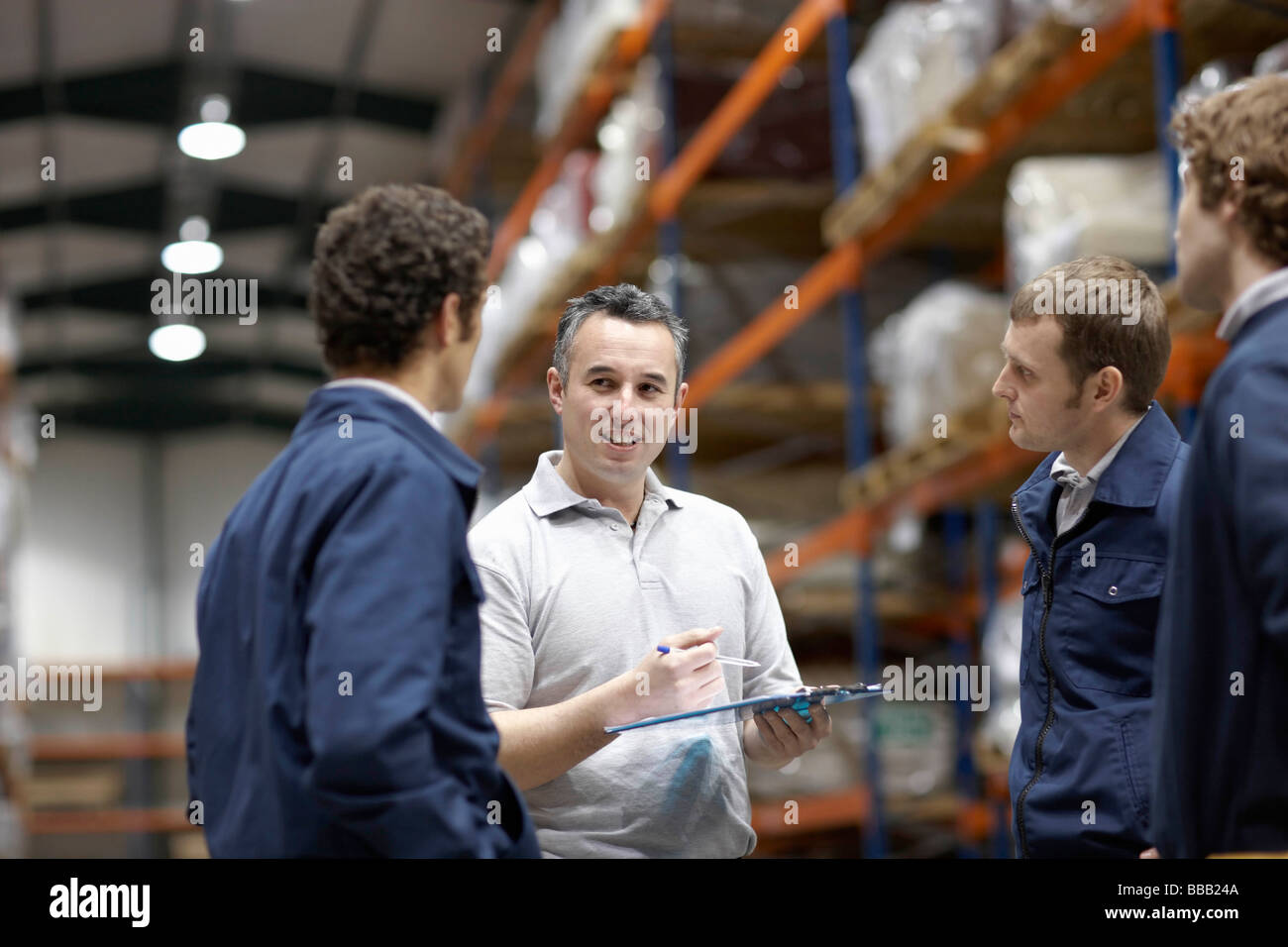 Workers in warehouse Stock Photo
