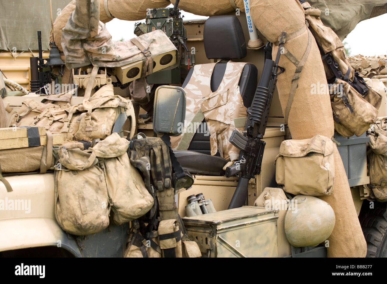 Army Jeep Vehicles Guns Desert Camouflaged Stock Photo