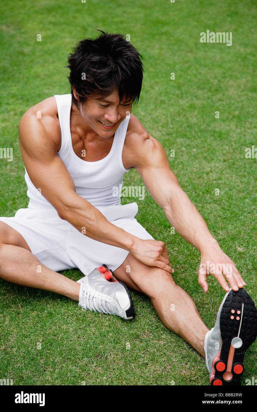 Muscular man stretches hi-res stock photography and images - Alamy