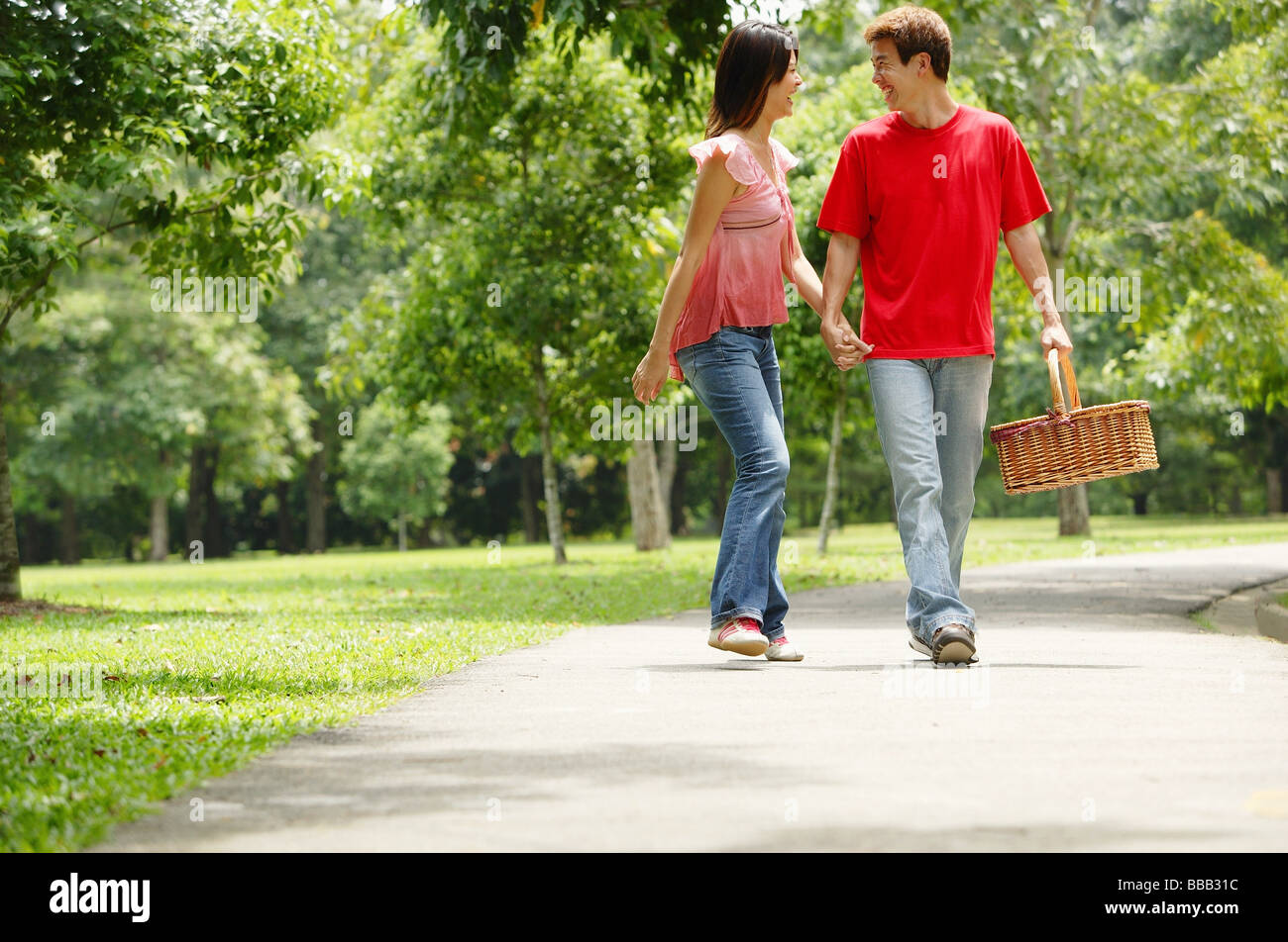 Walking away with picnic basket hi-res stock photography and images - Alamy