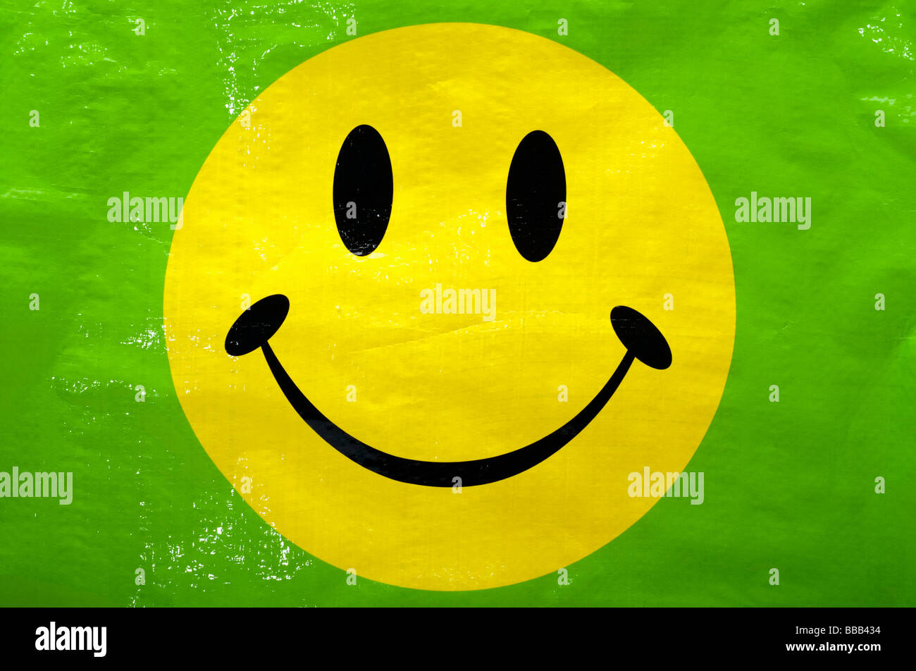 Closeup of a yellow smiley face on a plastic bag Stock Photo