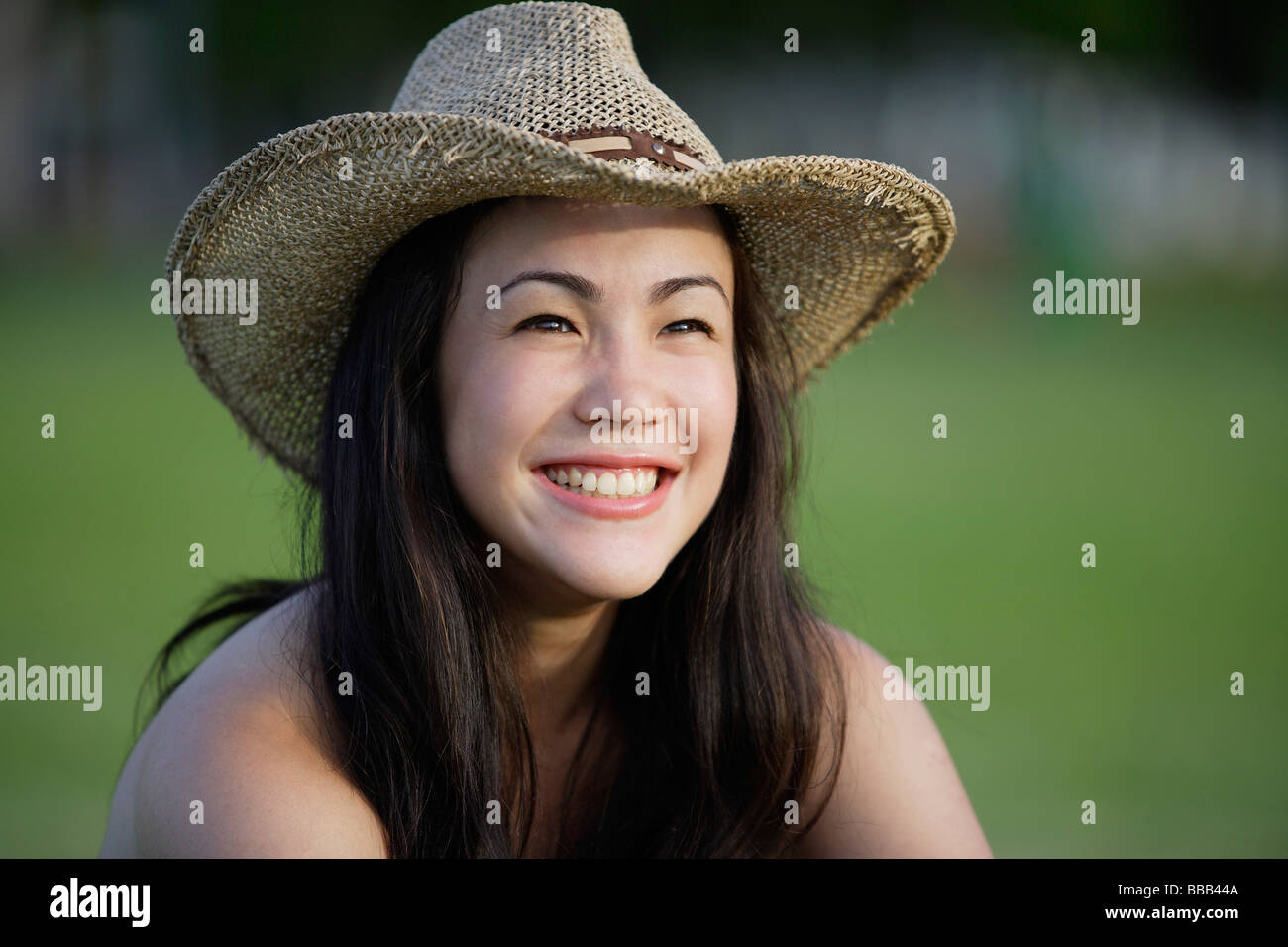 Asian woman wearing cowboy hat hi-res stock photography and images - Alamy