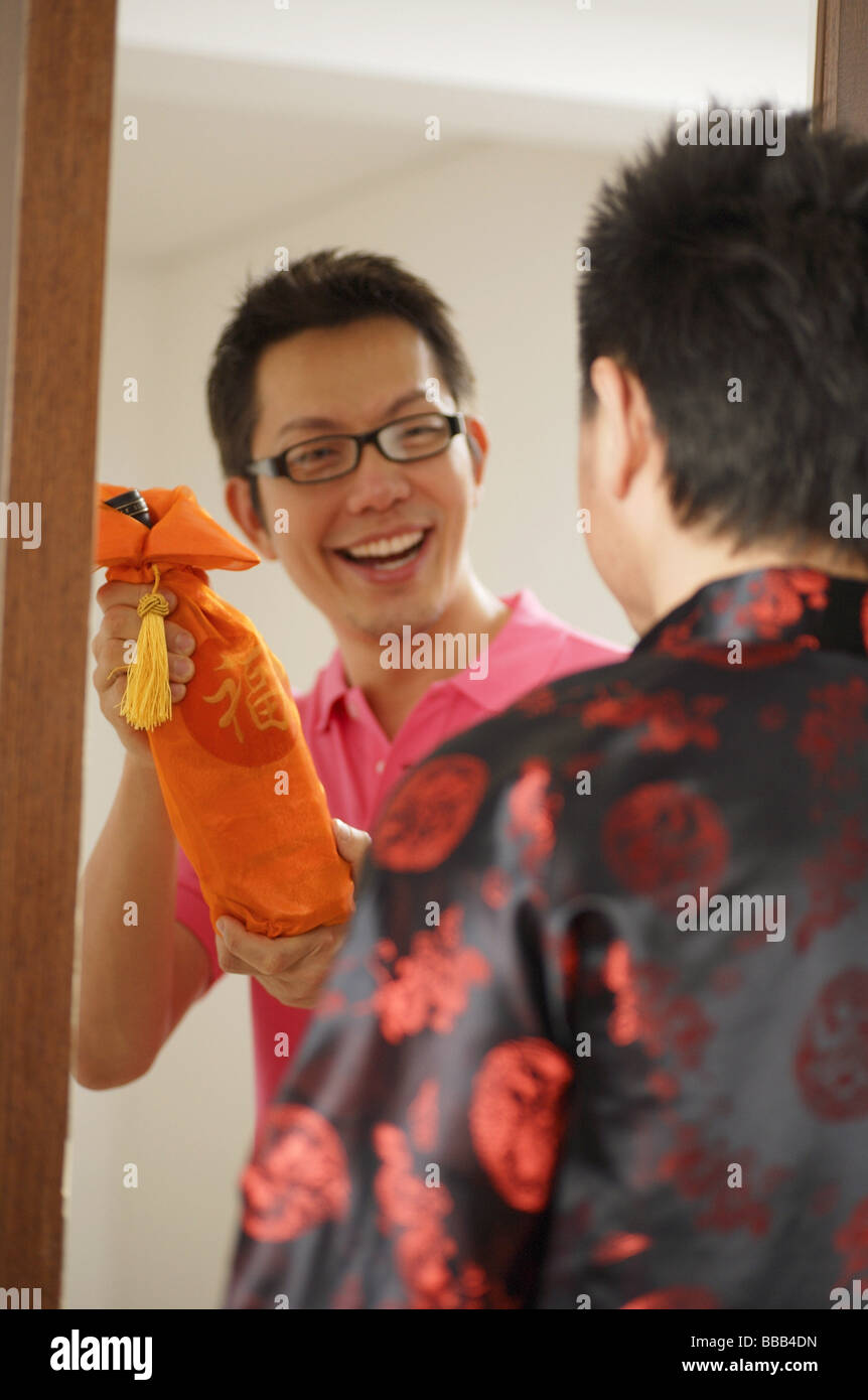 Man at door hi-res stock photography and images - Alamy