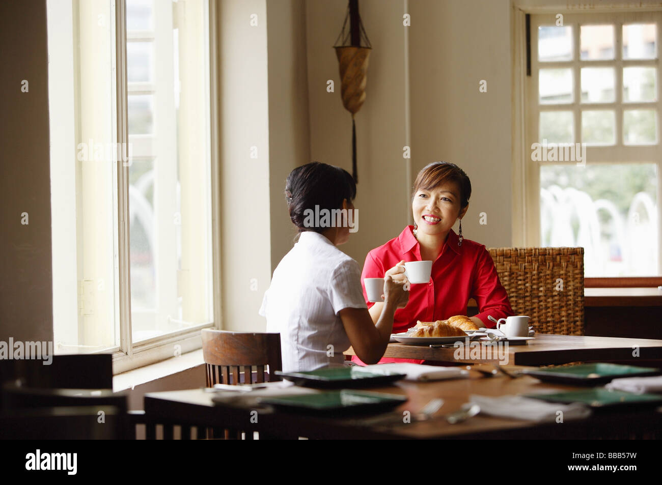 Two women in the cafe hi-res stock photography and images - Alamy
