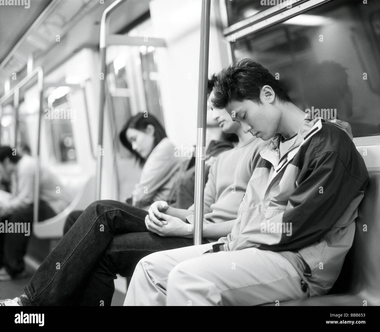 Sleeping on a train hi-res stock photography and images - Alamy