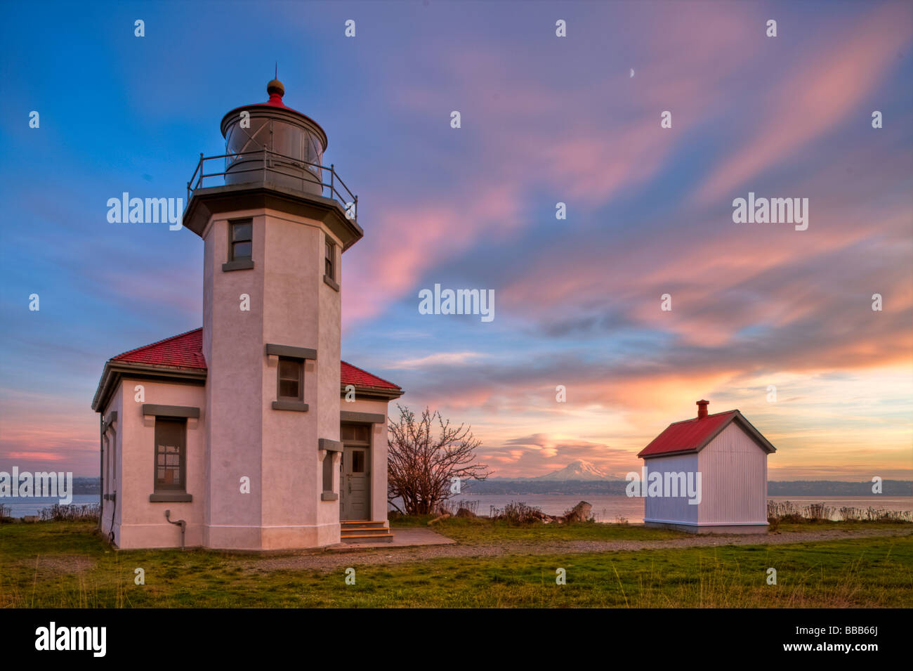 Vashon Island WA Point Robinson lighthouse on Puget Sound with sunset