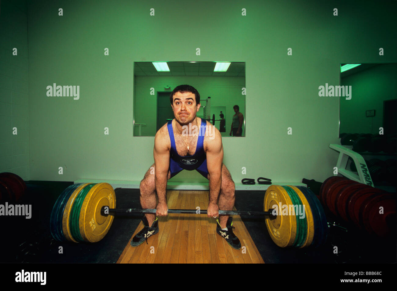 Body builder exercises vigorously Stock Photo Alamy