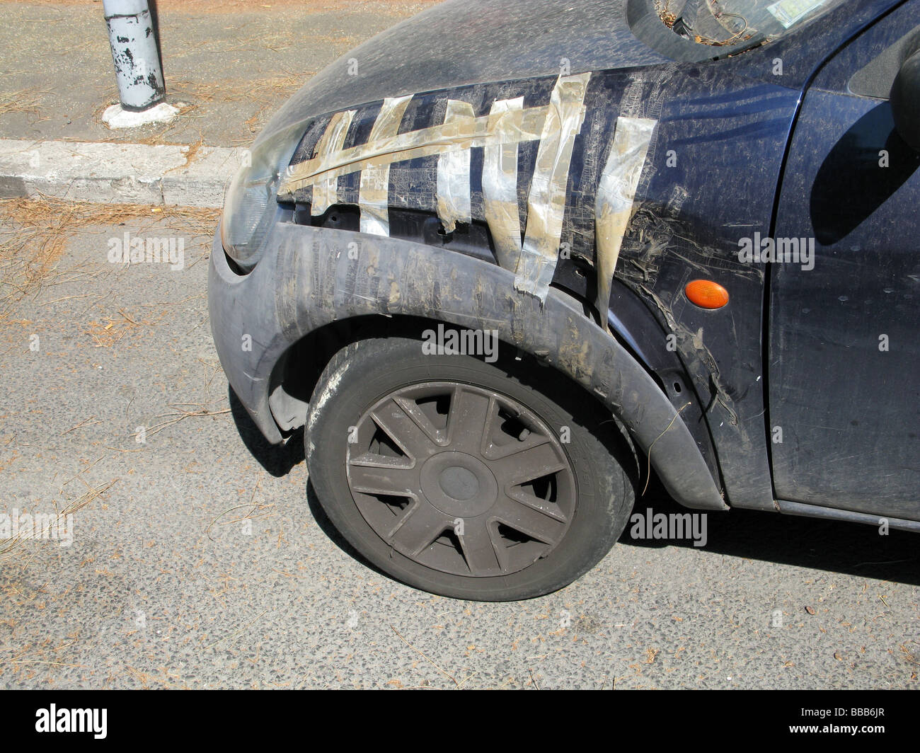 temporary repair for broken car hood wing side Stock Photo Alamy