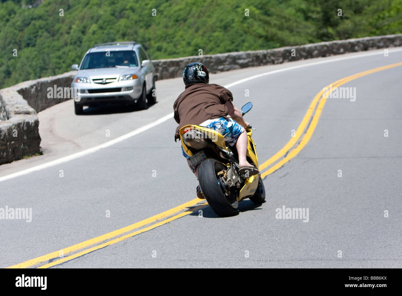 A motorbike motorcycle driving the winding road at Hawks Nest New York