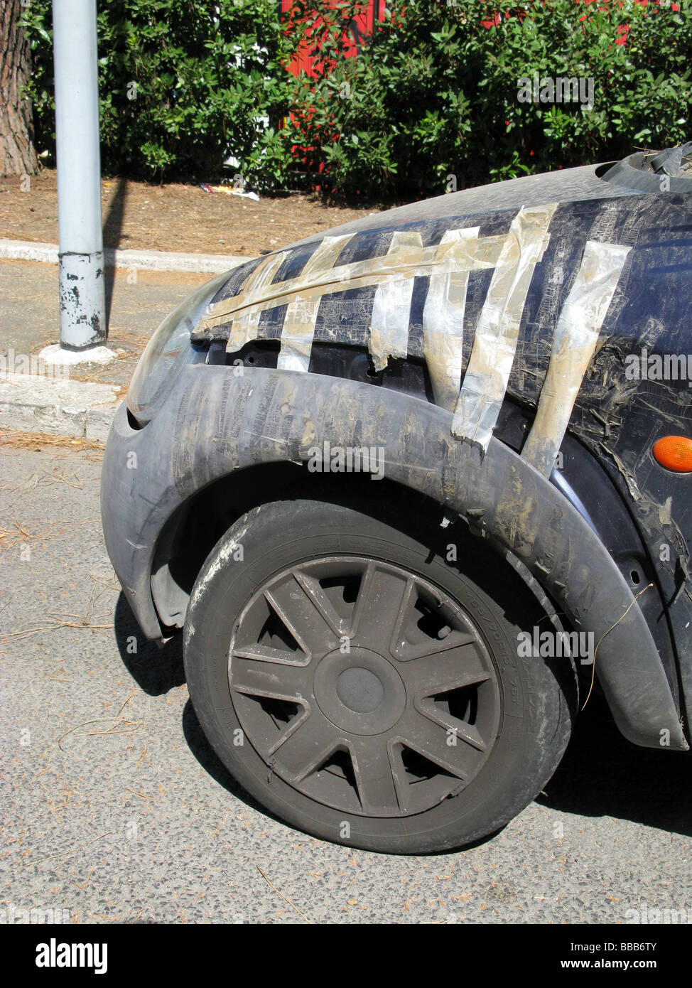 temporary repair for broken car hood wing side Stock Photo Alamy