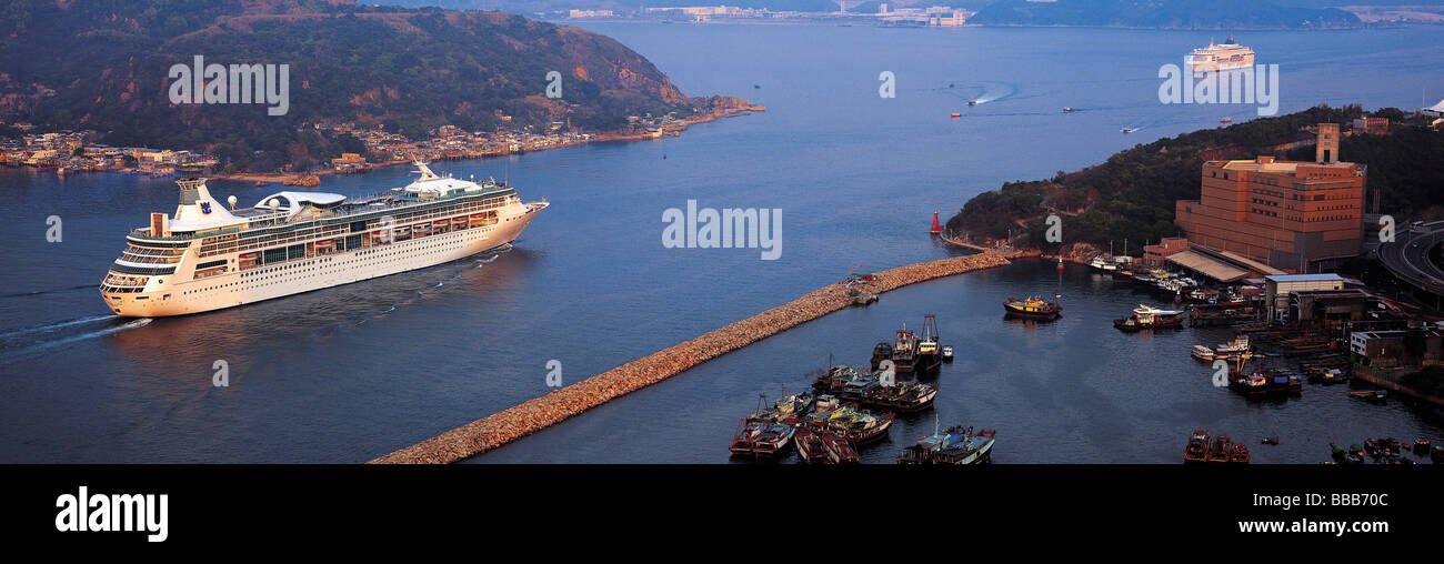 A cruise ship passes the Lei Yu Mun channel, the entrance of Victoria Harbour, Hong Kong Stock Photo