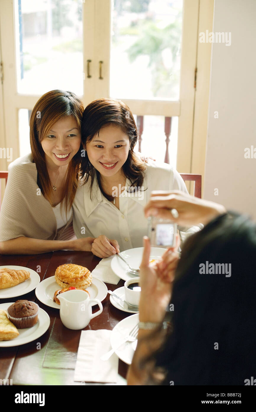 Smiling three women posing hi-res stock photography and images - Alamy