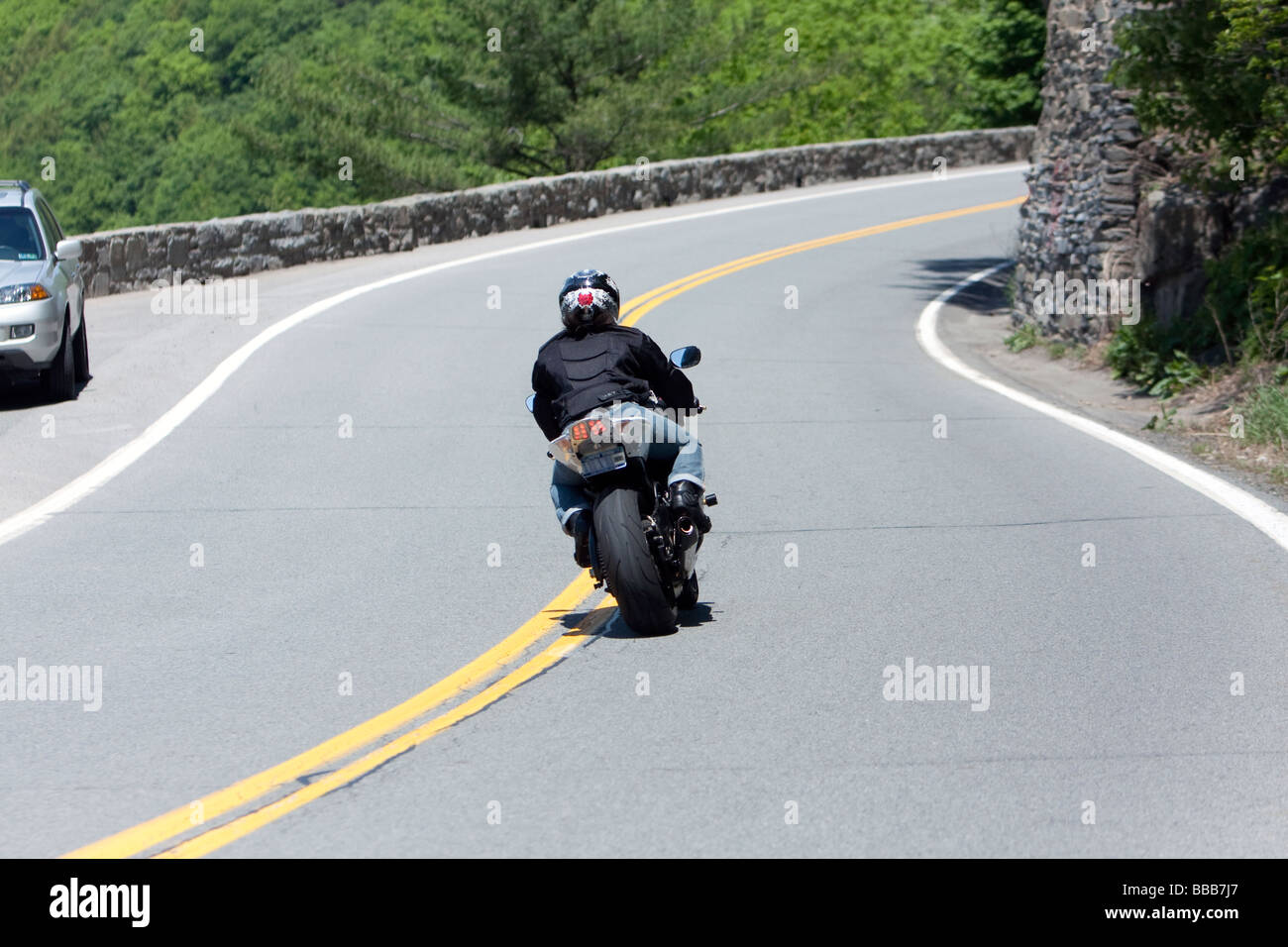 A motorbike motorcycle driving the winding road at Hawks Nest New York