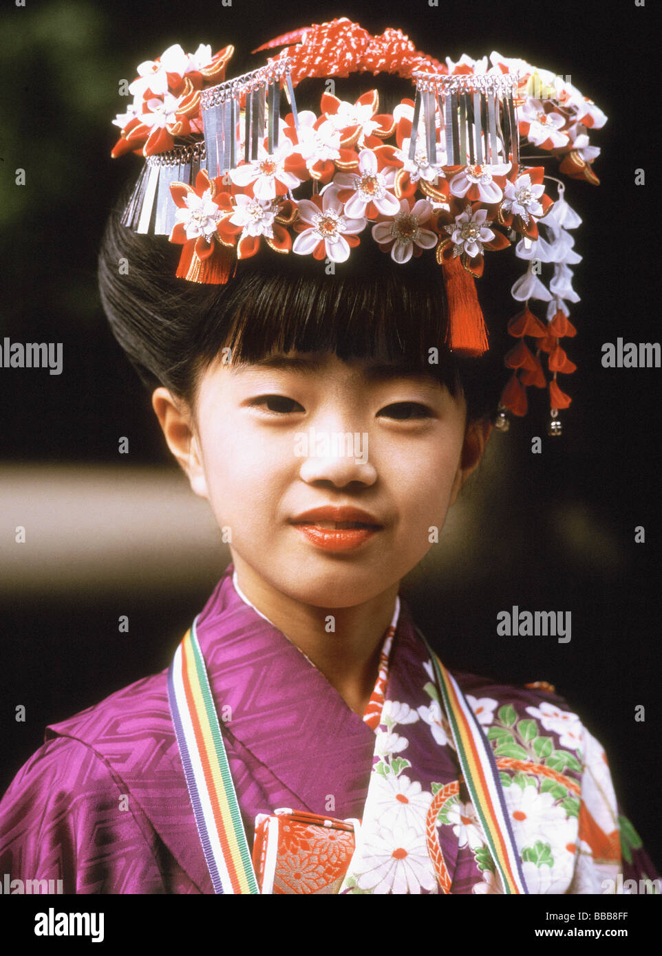 Japan, Seven year old girl in kimono at Shichi-Go-San (7-5-3) Festival (November) Stock Photo
