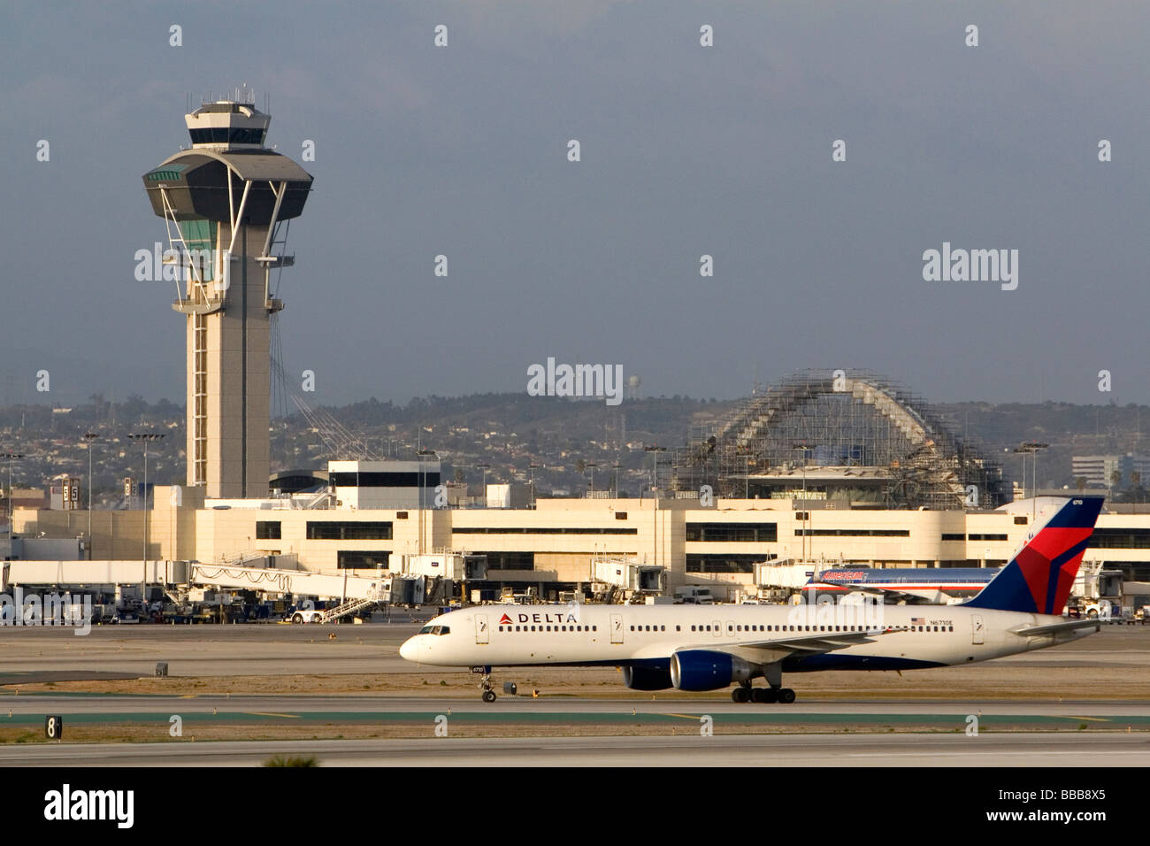 Delta Boeing 757 taxiing on the runway at LAX in Los Angeles California USA Stock Photo