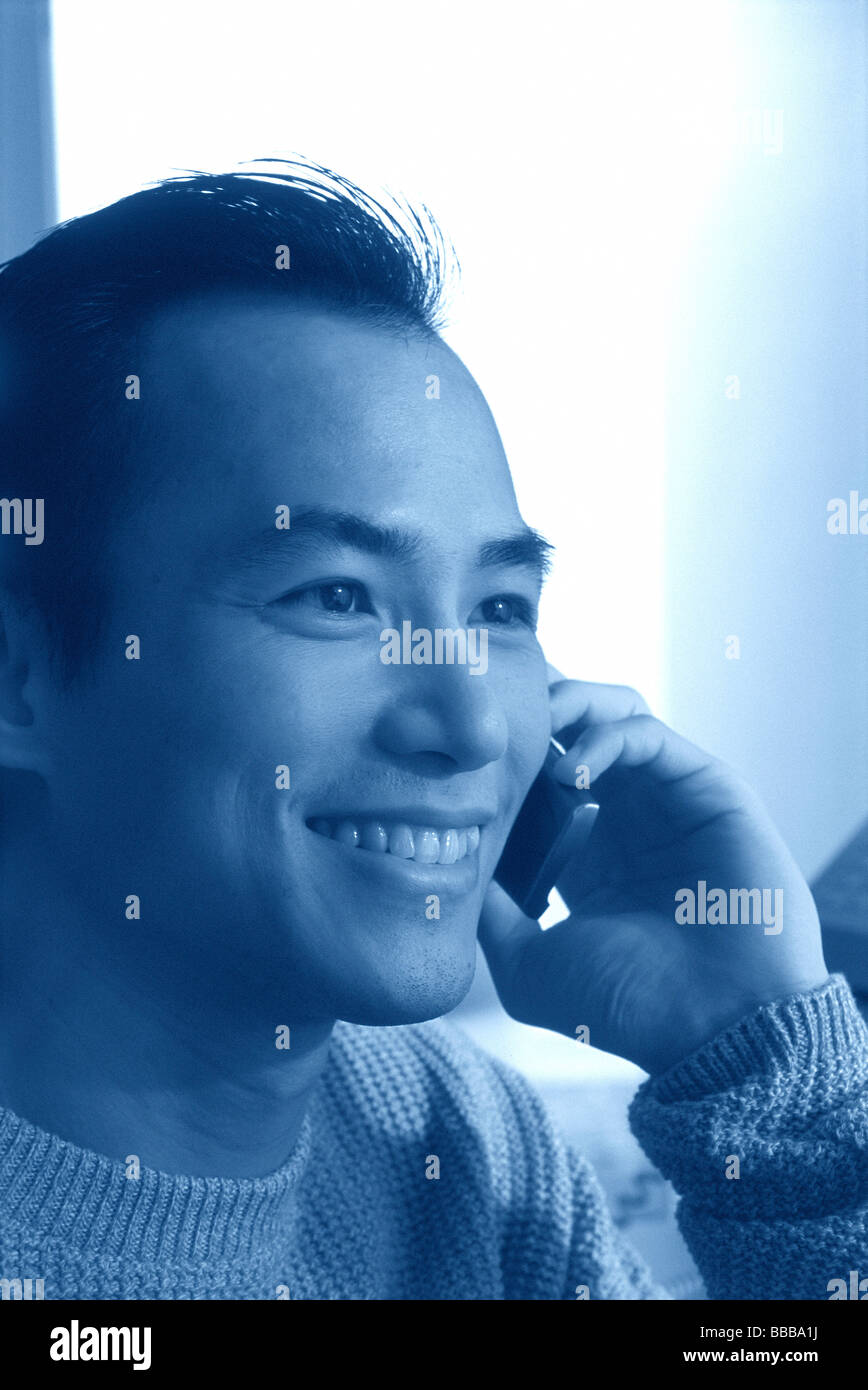 Man talking on cellular phone Stock Photo