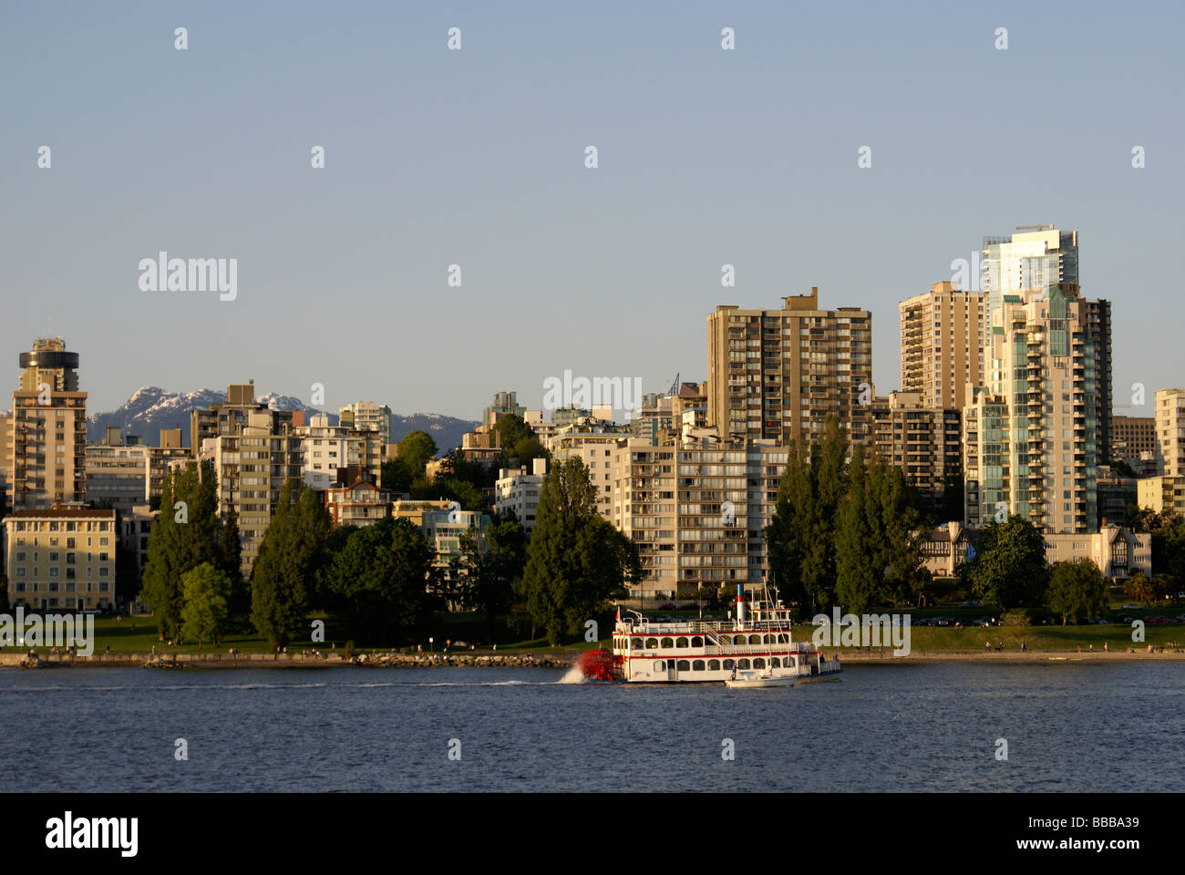 MPV Constitution paddlewheeler or sternwheeler sightseeing boat with West End skyline in back, English Bay, Vancouver, British Columbia, Canada Stock Photo