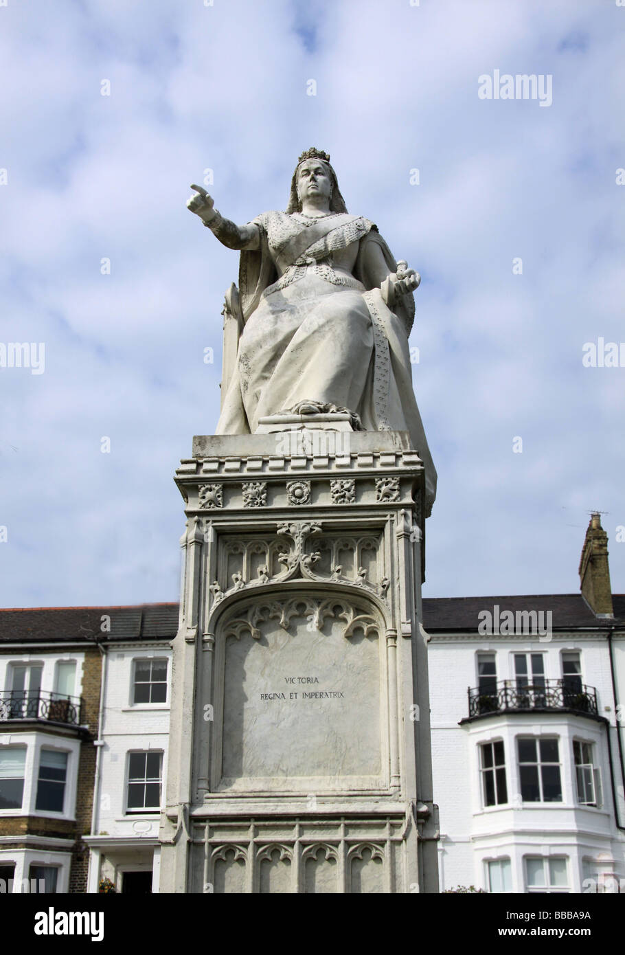 Statue of Queen Victoria pointing out to sea on Southend seafront with