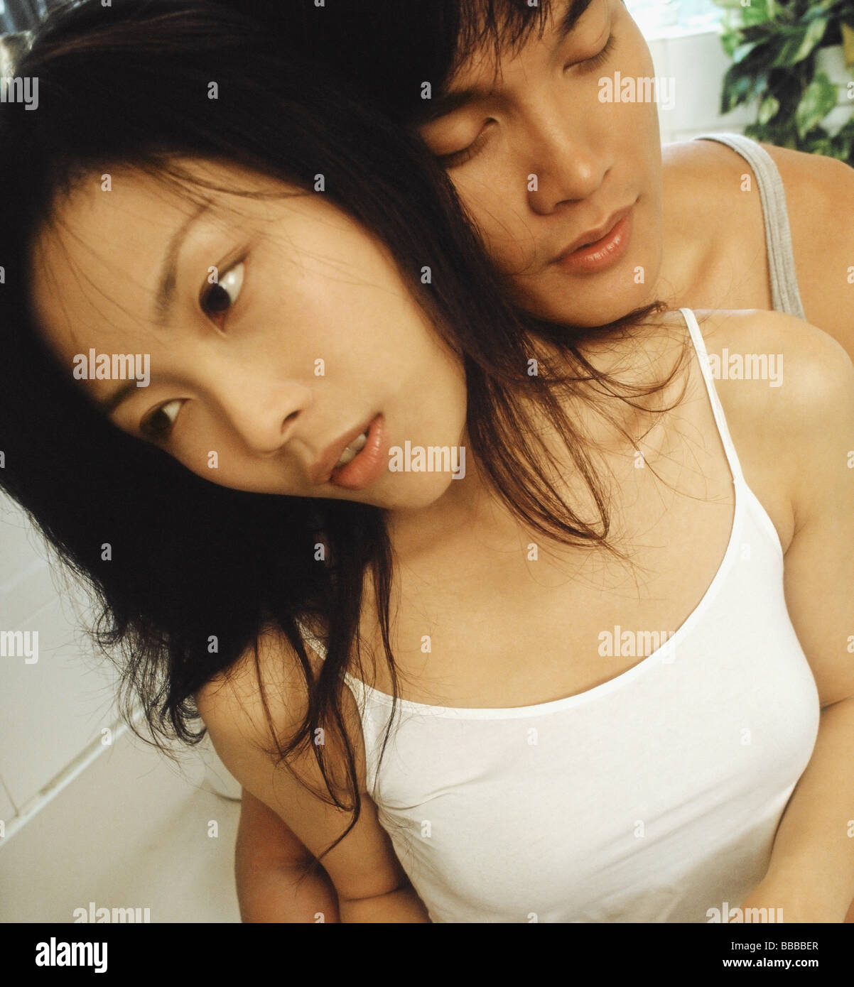 Black couple embracing sad hi-res stock photography and images - Alamy