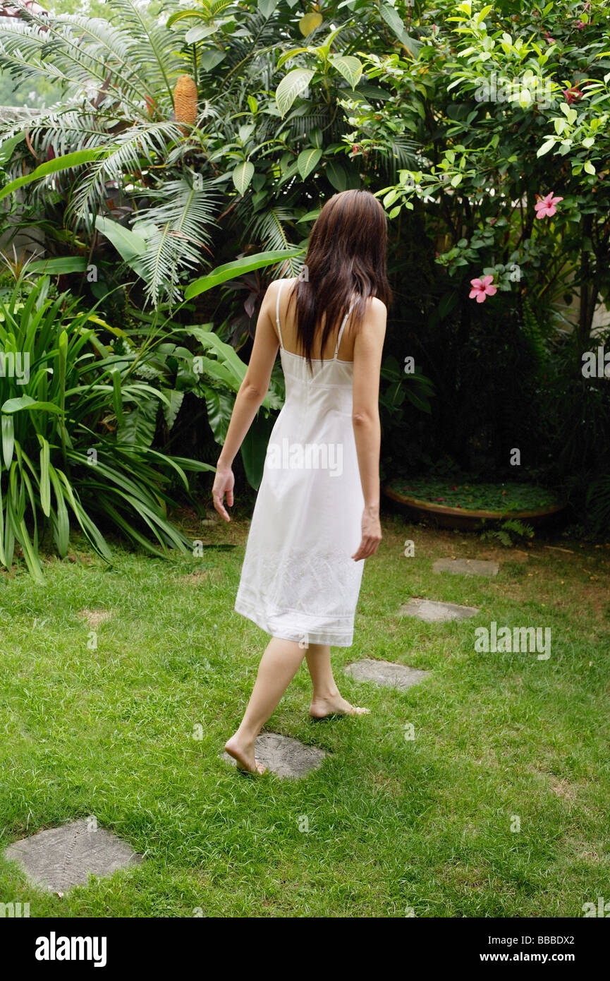 Walking barefoot grass asian hi-res stock photography and images - Alamy