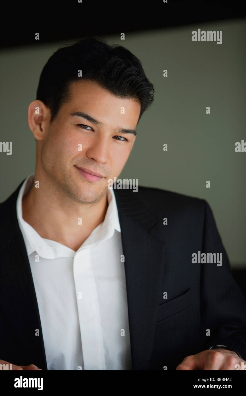 Man suit smiling home hi-res stock photography and images - Alamy