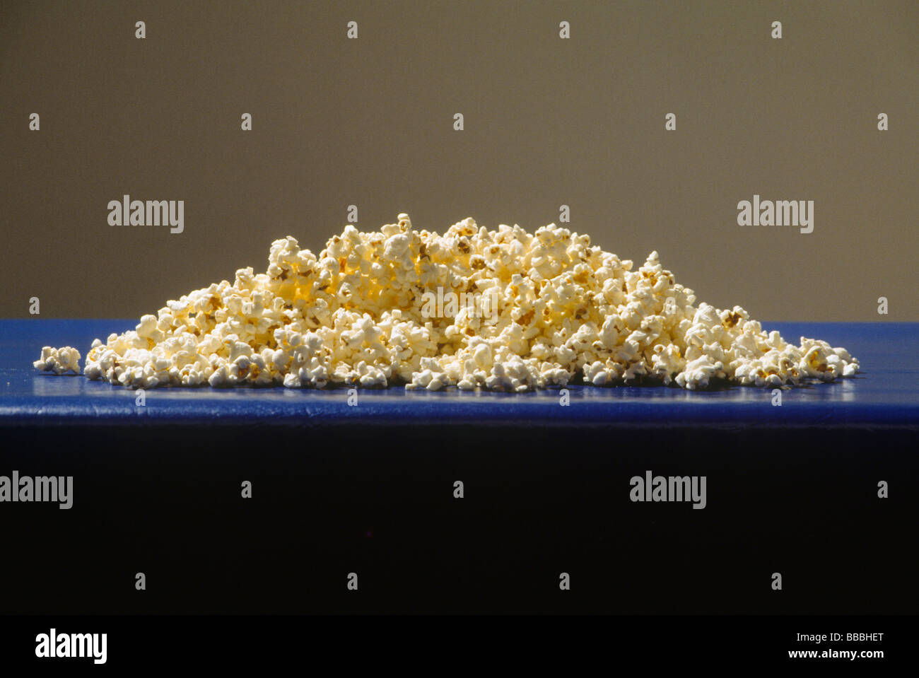 Popcorn snack food salt butter gold taste corn treat Stock Photo