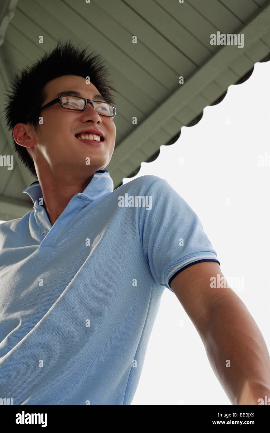 Man in a blue shirt hi-res stock photography and images - Alamy