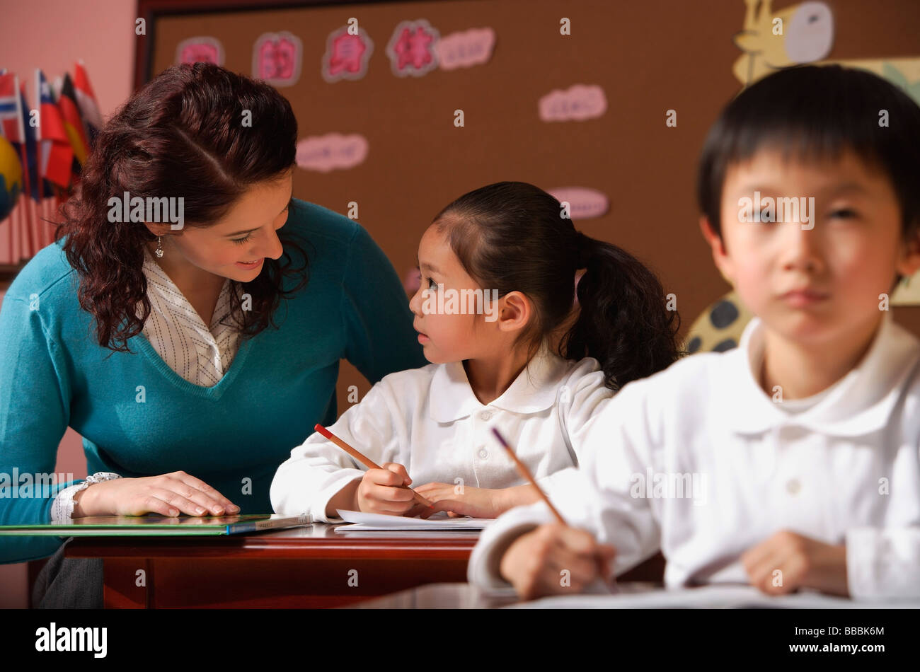 Students in class with teacher Stock Photo - Alamy