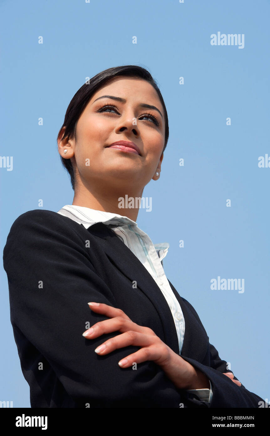 business woman with arms crossed Stock Photo - Alamy